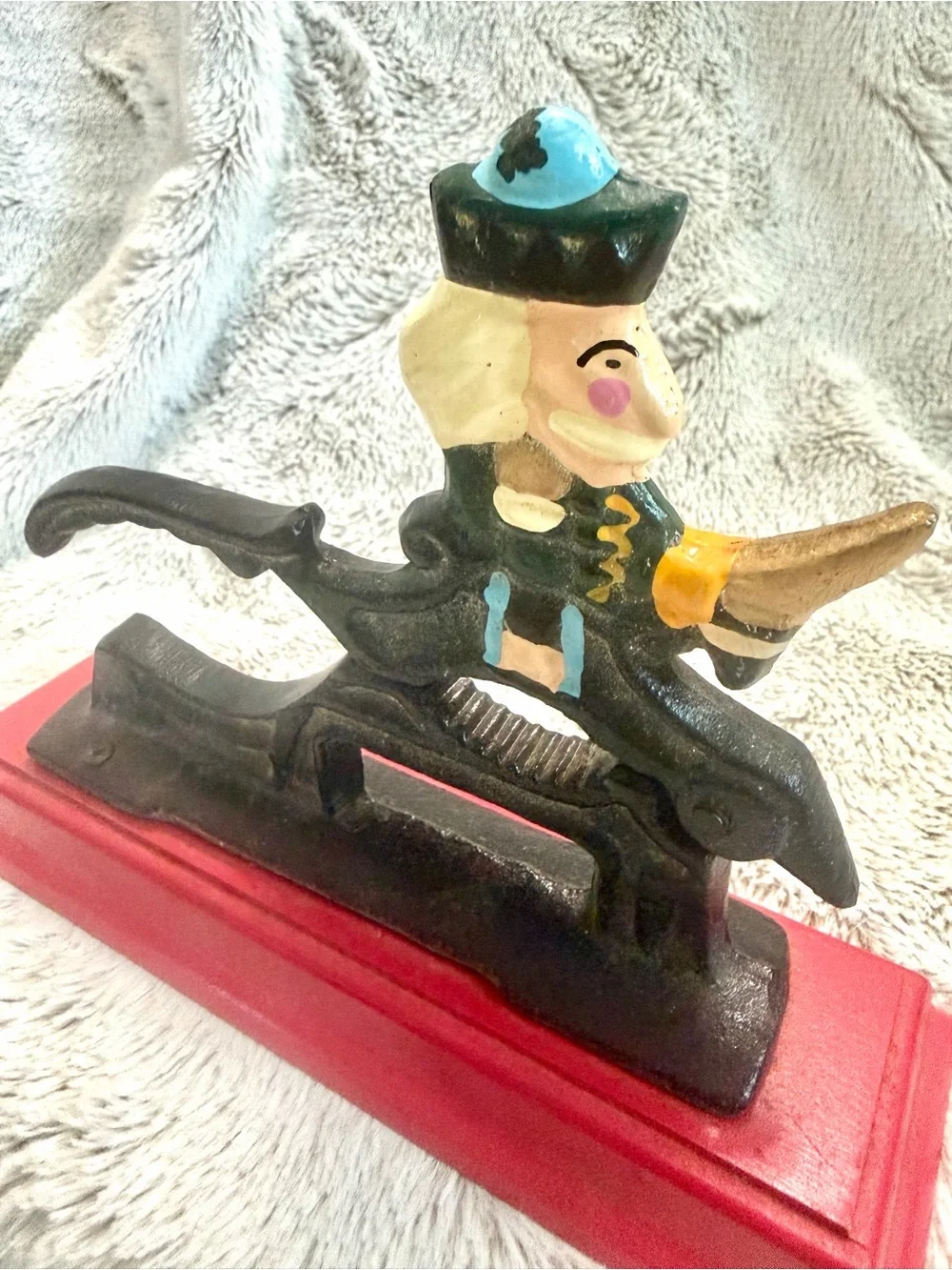 Vintage Cast Iron Nutcracker Figurine on Red Base